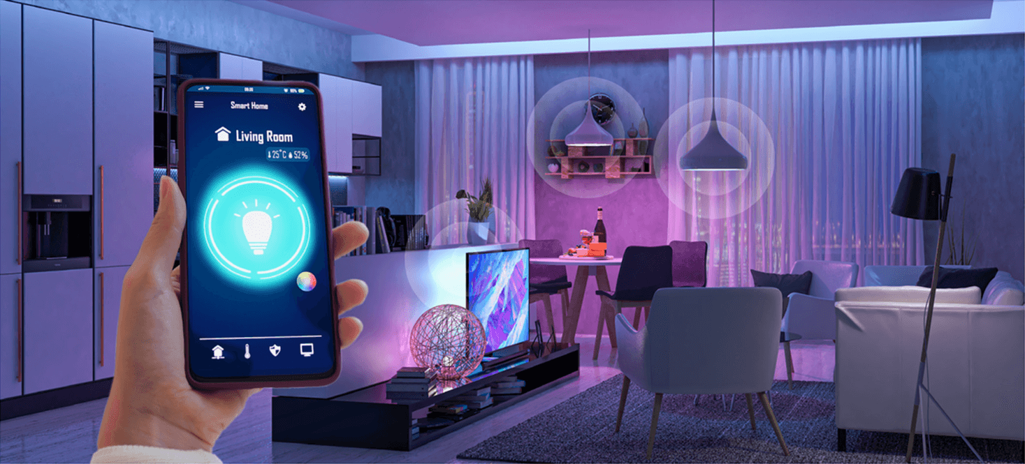 A person using a smartphone app to control smart lighting in a colorful modern living room.